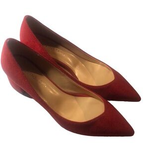 Woman’s red Christmas dress pump heels